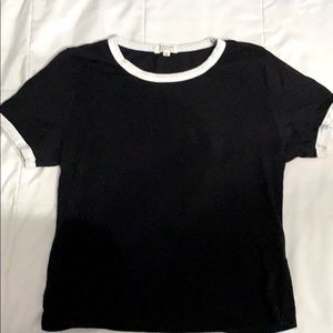 black shirt with white outline